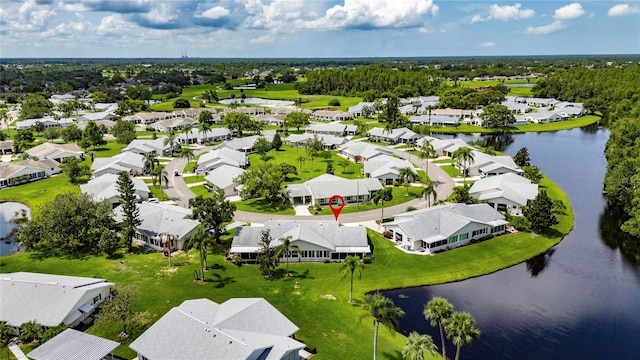 123 Glendower Cir Unit 123, Sun City Center, FL 33573 - aerial perspective of suburban area with a large body of water