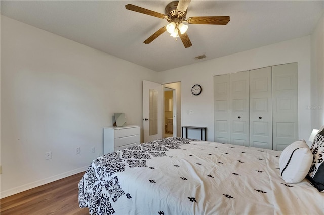 123 Glendower Cir Unit 123, Sun City Center, FL 33573 - bedroom featuring wood finished floors, a closet, and ceiling fan