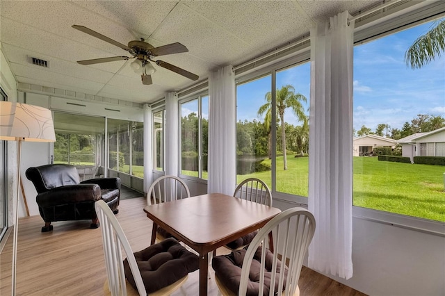 123 Glendower Cir Unit 123, Sun City Center, FL 33573 - sunroom with ceiling fan and wood finished floors