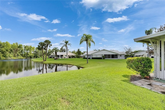 123 Glendower Cir Unit 123, Sun City Center, FL 33573 - view of grassy yard featuring a water view