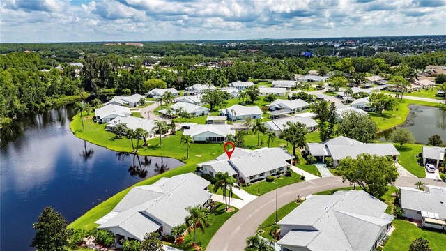123 Glendower Cir Unit 123, Sun City Center, FL 33573 - aerial view of residential area featuring a nearby body of water