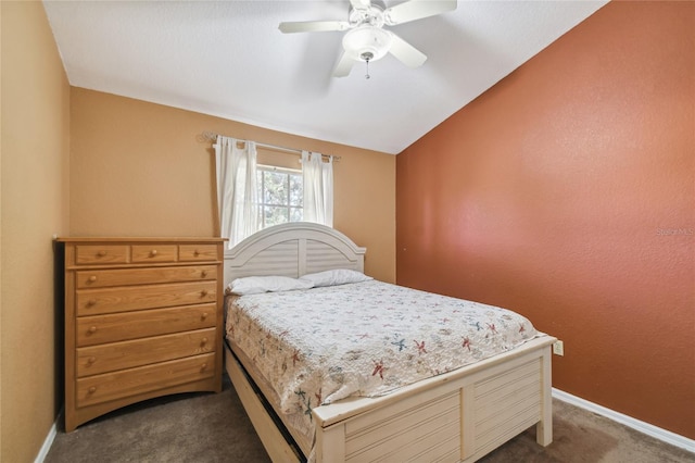 5908 Mohr Rd, Tampa, FL 33615 - bedroom with dark carpet and ceiling fan