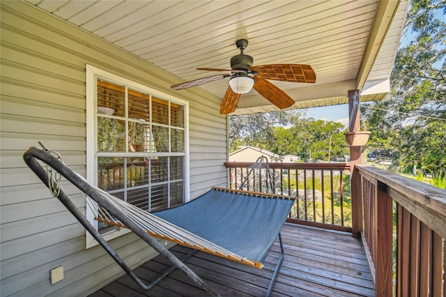 5908 Mohr Rd, Tampa, FL 33615 - wooden porch featuring a ceiling fan