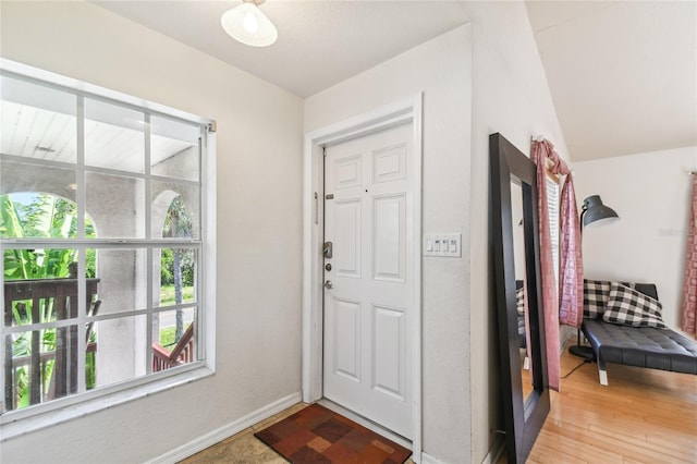 5908 Mohr Rd, Tampa, FL 33615 - entryway featuring baseboards and wood finished floors