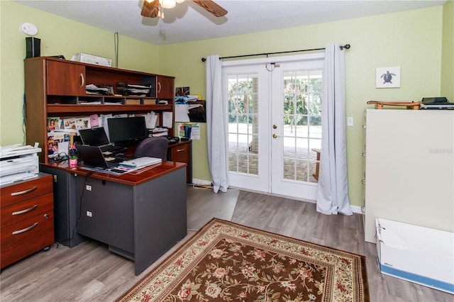 11945 Darwin Ave, New Port Richey, FL 34654 - office area with wood finished floors, french doors, and a ceiling fan