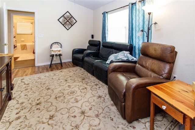 11945 Darwin Ave, New Port Richey, FL 34654 - living area with wood finished floors and baseboards