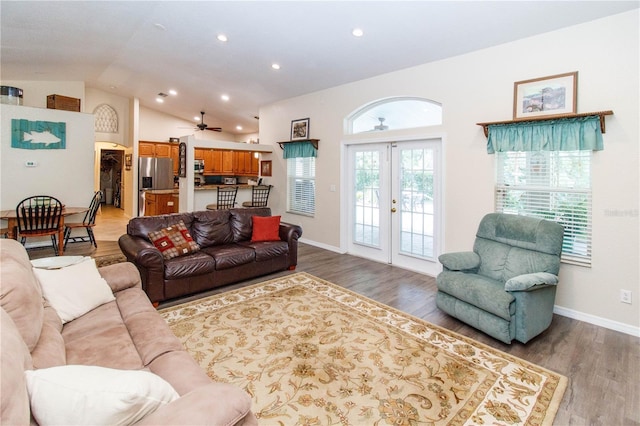 11945 Darwin Ave, New Port Richey, FL 34654 - living room with a ceiling fan, french doors, light wood-style flooring, lofted ceiling, and recessed lighting