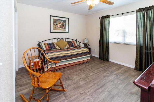 11945 Darwin Ave, New Port Richey, FL 34654 - bedroom featuring wood finished floors and ceiling fan