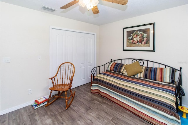 11945 Darwin Ave, New Port Richey, FL 34654 - bedroom with a closet, wood finished floors, and ceiling fan