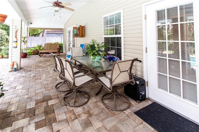 11945 Darwin Ave, New Port Richey, FL 34654 - view of patio / terrace featuring a ceiling fan and outdoor dining area