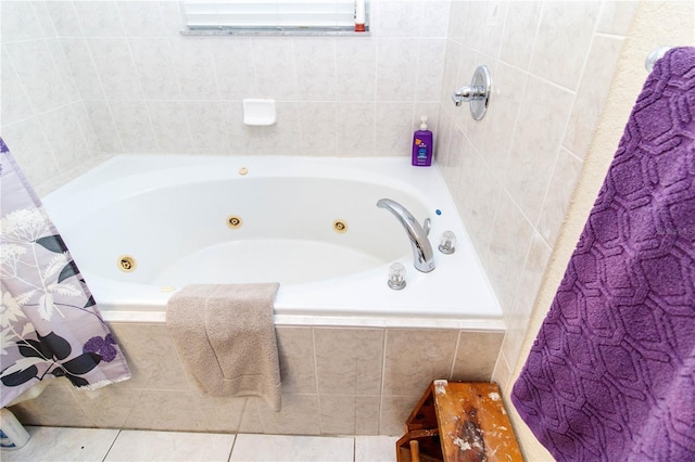 11945 Darwin Ave, New Port Richey, FL 34654 - bathroom with a tub with jets and tile patterned floors