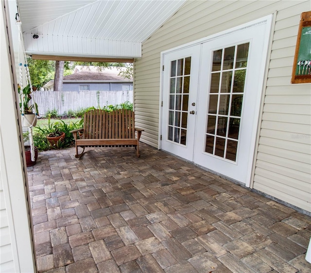 11945 Darwin Ave, New Port Richey, FL 34654 - sunroom / solarium featuring french doors and lofted ceiling