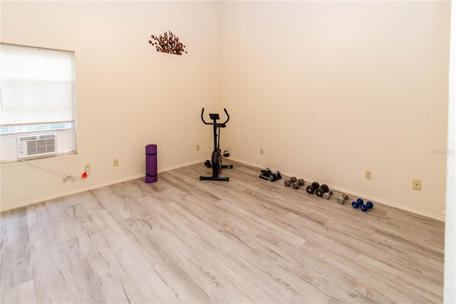 11945 Darwin Ave, New Port Richey, FL 34654 - exercise area featuring wood finished floors and cooling unit