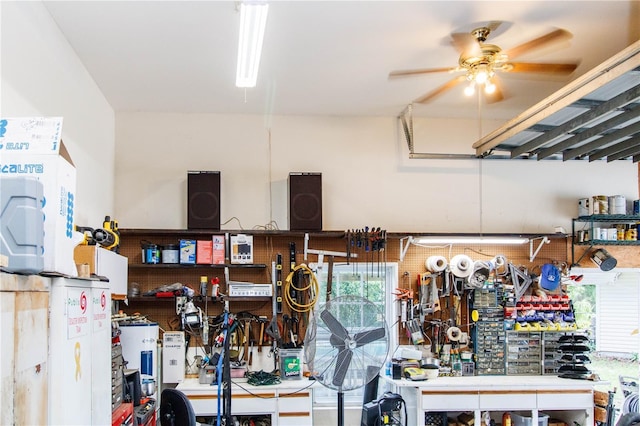 11945 Darwin Ave, New Port Richey, FL 34654 - garage featuring a workshop area and a ceiling fan