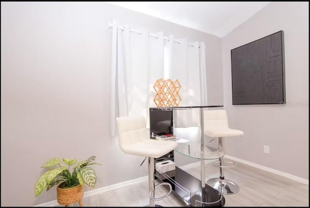 1004 Osage St, Clearwater, FL 33755 - home office featuring wood finished floors and lofted ceiling