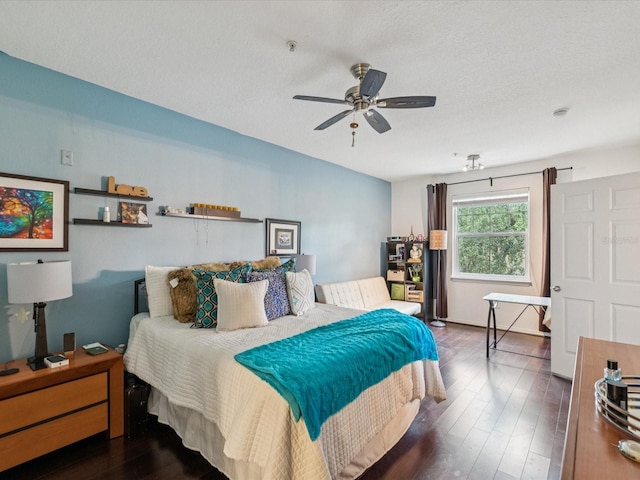 2010 E Palm Ave Unit 14303, Tampa, FL 33605 - bedroom featuring wood finished floors, ceiling fan, and a textured ceiling