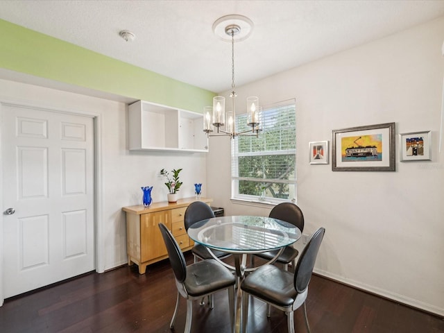 2010 E Palm Ave Unit 14303, Tampa, FL 33605 - dining area featuring a chandelier and dark wood finished floors