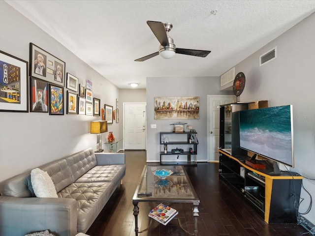 2010 E Palm Ave Unit 14303, Tampa, FL 33605 - living area featuring a ceiling fan, wood finished floors, and a textured ceiling