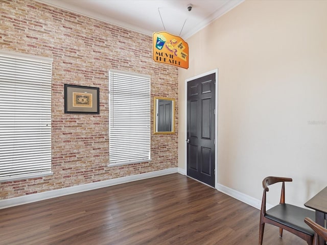 2010 E Palm Ave Unit 14303, Tampa, FL 33605 - foyer entrance with dark wood finished floors, ornamental molding, brick wall, and healthy amount of natural light
