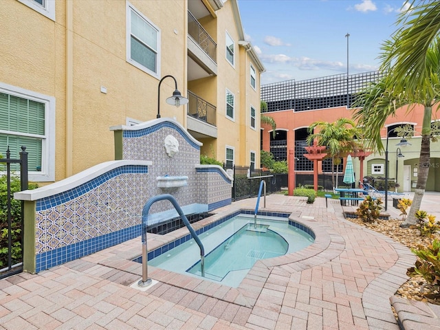 2010 E Palm Ave Unit 14303, Tampa, FL 33605 - view of pool with a hot tub and a swimming pool