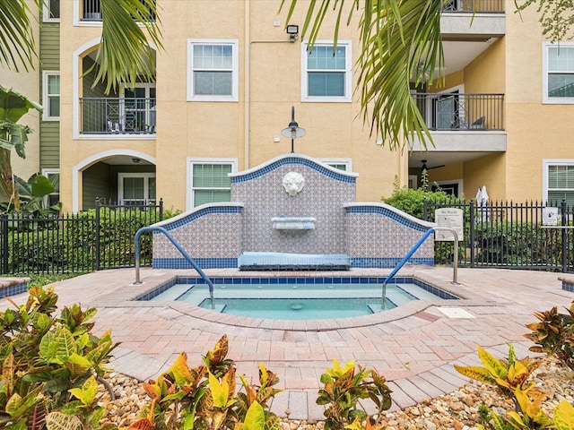 2010 E Palm Ave Unit 14303, Tampa, FL 33605 - view of swimming pool featuring a hot tub