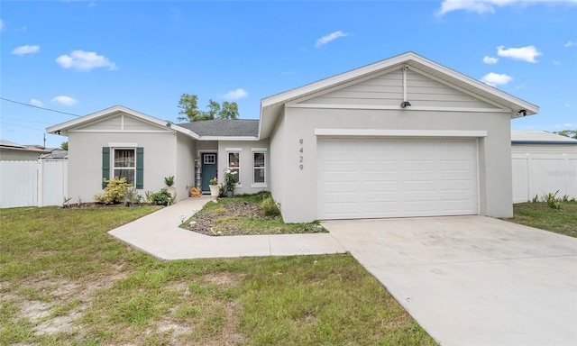 9429 Northcliffe Blvd, Spring Hill, FL 34606 - ranch-style house with stucco siding, driveway, and an attached garage