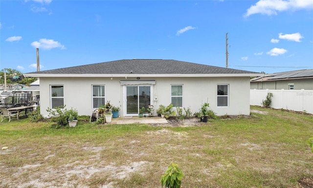 9429 Northcliffe Blvd, Spring Hill, FL 34606 - rear view of property featuring stucco siding and a shingled roof
