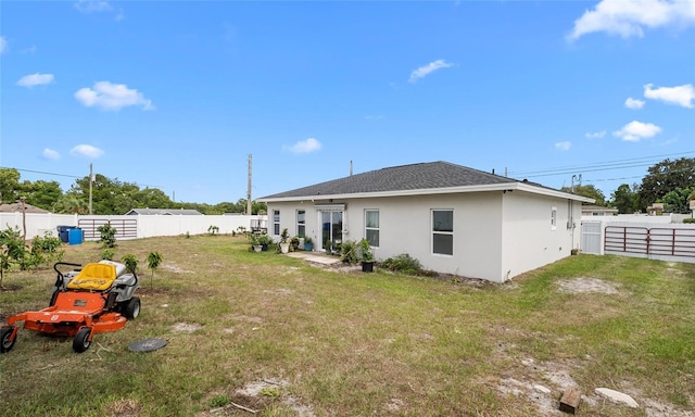 9429 Northcliffe Blvd, Spring Hill, FL 34606 - rear view of property featuring stucco siding, a fenced backyard, and a shingled roof