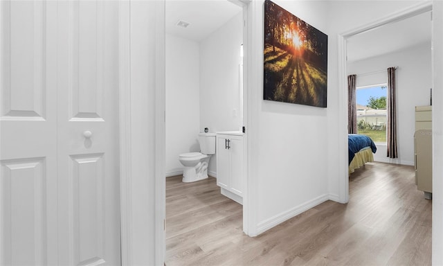 9429 Northcliffe Blvd, Spring Hill, FL 34606 - bathroom with wood finished floors and a closet
