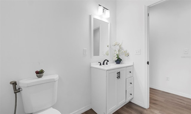 9429 Northcliffe Blvd, Spring Hill, FL 34606 - half bathroom with vanity and wood finished floors
