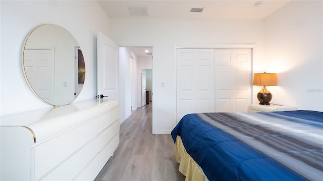 9429 Northcliffe Blvd, Spring Hill, FL 34606 - bedroom featuring light wood-style flooring and a closet