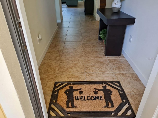 8923 Cuban Palm Rd, Kissimmee, FL 34747 - hall with baseboards and tile patterned flooring