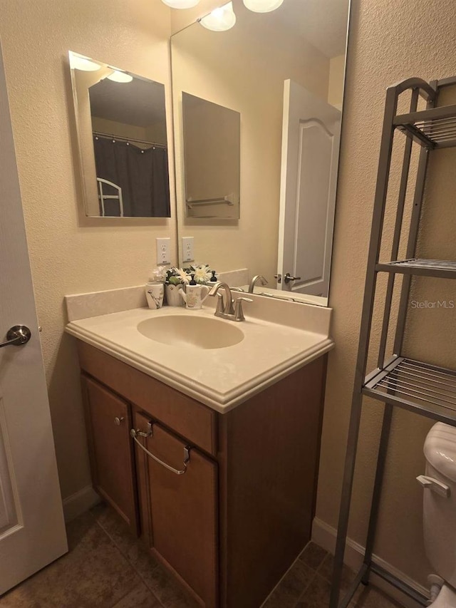 8923 Cuban Palm Rd, Kissimmee, FL 34747 - full bathroom featuring tile patterned flooring and vanity