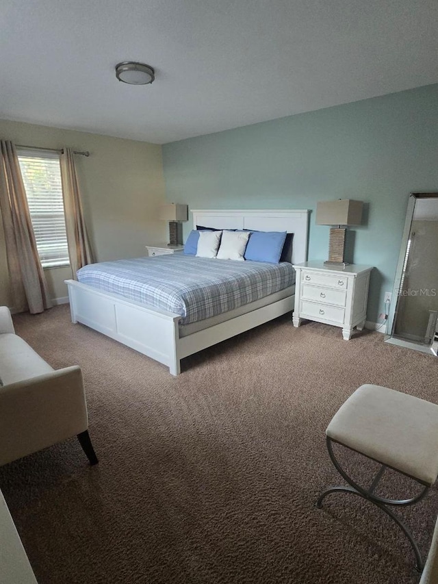 8923 Cuban Palm Rd, Kissimmee, FL 34747 - bedroom featuring light colored carpet and baseboards