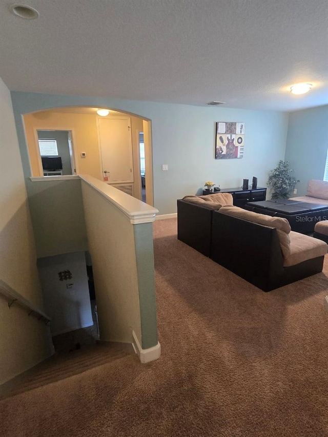 8923 Cuban Palm Rd, Kissimmee, FL 34747 - carpeted living area with baseboards
