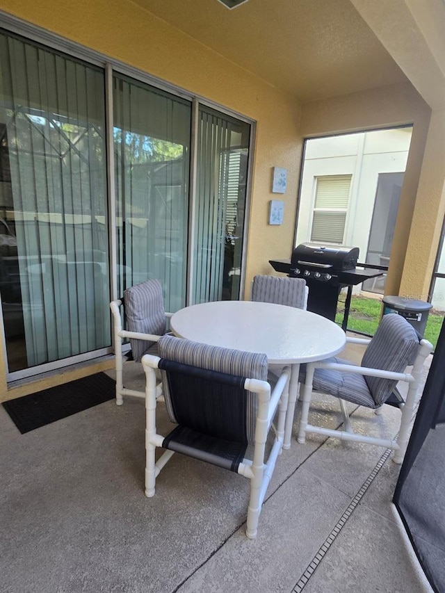 8923 Cuban Palm Rd, Kissimmee, FL 34747 - view of patio featuring outdoor dining space