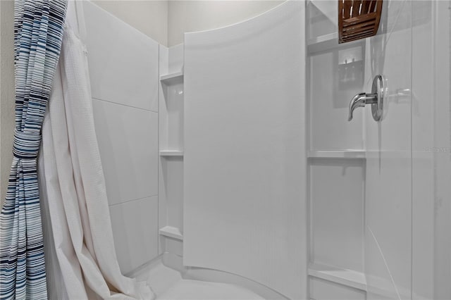 12277 Spring Hill Dr, Spring Hill, FL 34609 - bathroom featuring a shower with shower curtain