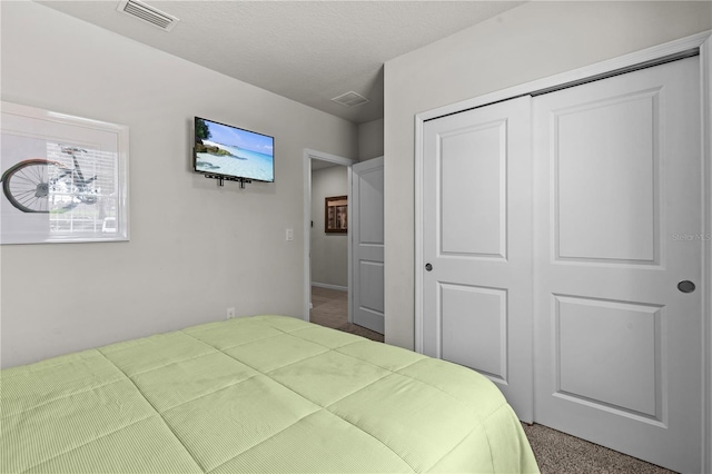 12277 Spring Hill Dr, Spring Hill, FL 34609 - bedroom with a closet and carpet flooring
