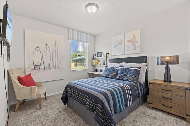 12277 Spring Hill Dr, Spring Hill, FL 34609 - bedroom with light colored carpet and a textured ceiling
