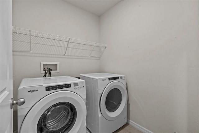 12277 Spring Hill Dr, Spring Hill, FL 34609 - washroom with independent washer and dryer