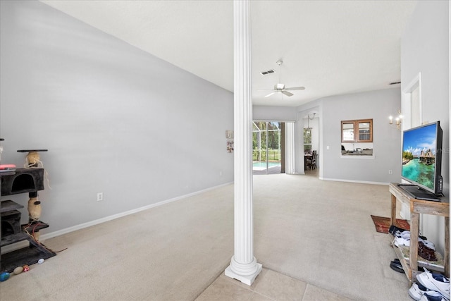 27826 Sora Blvd, Wesley Chapel, FL 33544 - carpeted living area with a ceiling fan and baseboards
