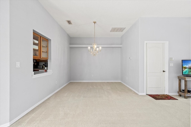 27826 Sora Blvd, Wesley Chapel, FL 33544 - carpeted empty room with a chandelier and baseboards