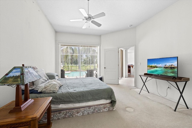 27826 Sora Blvd, Wesley Chapel, FL 33544 - bedroom featuring access to exterior, carpet, and a ceiling fan