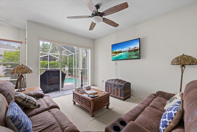 27826 Sora Blvd, Wesley Chapel, FL 33544 - living room with a ceiling fan and carpet floors