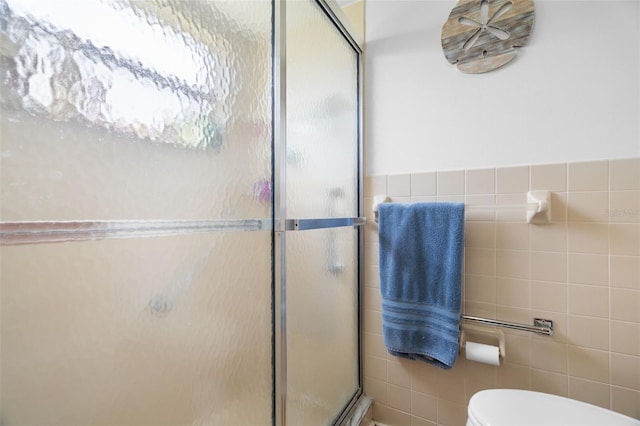 7022 Kingsway Dr, Port Richey, FL 34668 - bathroom featuring tile walls and a shower stall
