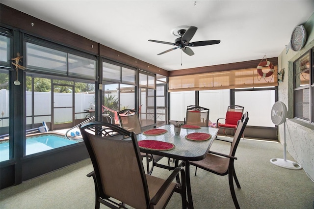 7022 Kingsway Dr, Port Richey, FL 34668 - dining area with carpet flooring and a ceiling fan