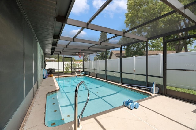 7022 Kingsway Dr, Port Richey, FL 34668 - view of swimming pool featuring a patio area and a lanai