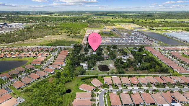 2221 W Lake Dr, Wimauma, FL 33598 - aerial overview of property's location featuring nearby suburban area