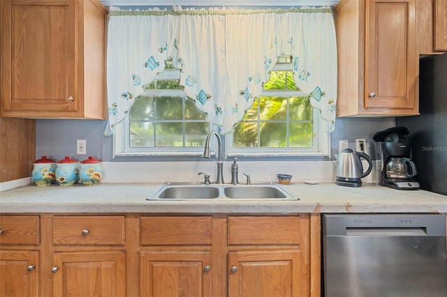 2221 W Lake Dr, Wimauma, FL 33598 - kitchen featuring dishwasher, light countertops, and brown cabinetry
