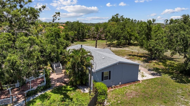 2221 W Lake Dr, Wimauma, FL 33598 - view from above of property with a heavily wooded area